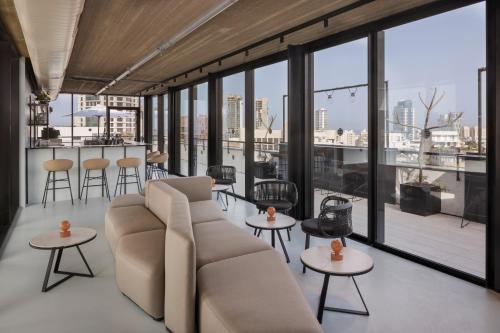 Χώρος καθιστικού στο Gymnasia Isrotel, a Tribute Portfolio Hotel
