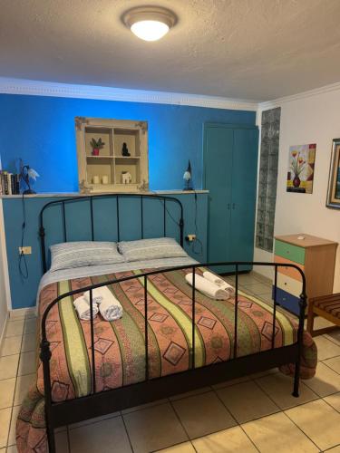 A bed or beds in a room at Il Vicolo Palinuro