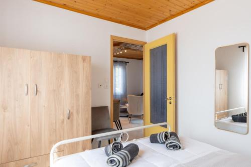 Ένα ή περισσότερα κρεβάτια σε δωμάτιο στο Mermaid Home