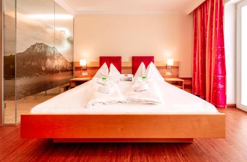 Un ou plusieurs lits dans un hébergement de l'établissement Panorama Hotel Traunstein