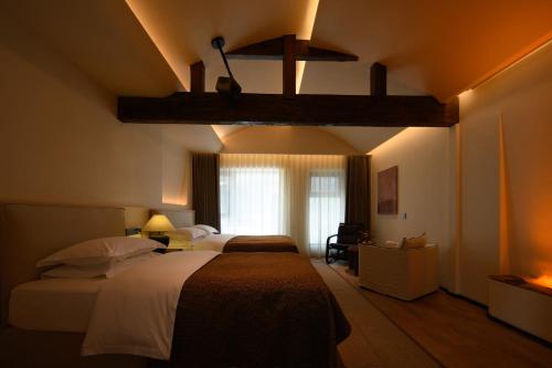 Katil atau katil-katil dalam bilik di Shaxi Fengyasong Village Hotel