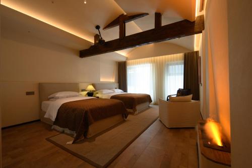 Katil atau katil-katil dalam bilik di Shaxi Fengyasong Village Hotel