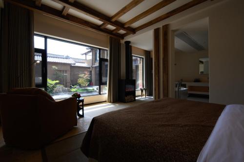 Katil atau katil-katil dalam bilik di Shaxi Fengyasong Village Hotel