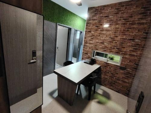 Кухня или мини-кухня в Chieng Apartment Kiulap Negara Brunei Darussalam
