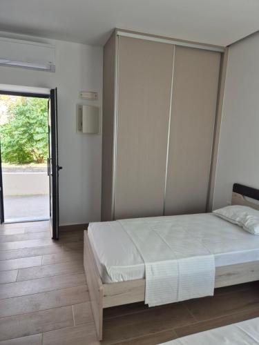 Postel nebo postele na pokoji v ubytování Aldea Apartments