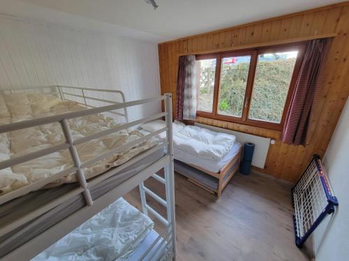 Postel nebo postele na pokoji v ubytování Vacances à la montagne