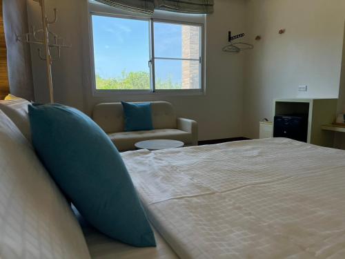 Una cama o camas en una habitación de 白海民宿