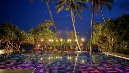 Bazén v ubytování Ananya Beach Resort nebo v jeho okolí