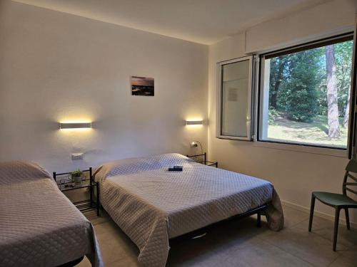 Postel nebo postele na pokoji v ubytování App4rent - Villa Cristina 5 - RINNOVATO