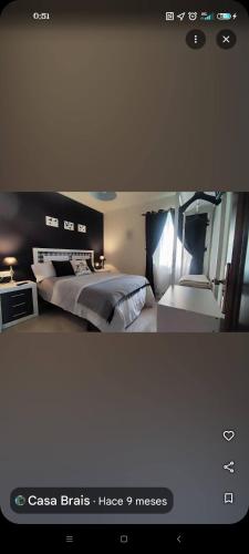 a picture of a bedroom with a bed at Casa BRAIS in Barreiros