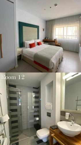 a hotel room with a bed and a sink at Bat Galim Boutique Hotel in Haifa