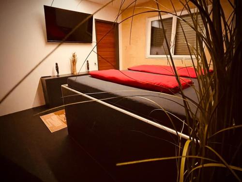 Loft 4-roomにあるベッド