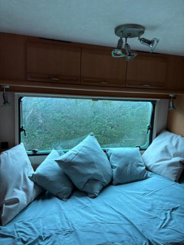Postel nebo postele na pokoji v ubytování Caravan 3 personen