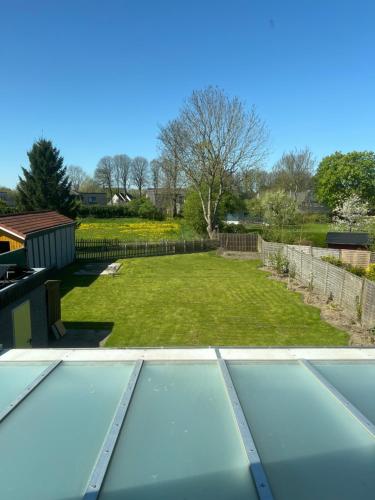 a view of a swimming pool in a yard at Sweet vacation in Harrislee
