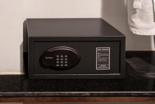 a microwave oven sitting on top of a counter at Hoi An Odyssey Hotel & Spa in Hoi An