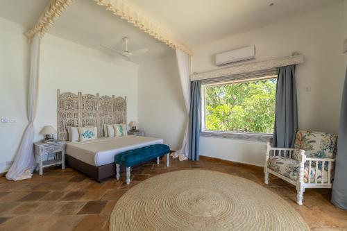 Ένα ή περισσότερα κρεβάτια σε δωμάτιο στο Chale Island Resort