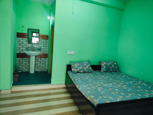 Ένα ή περισσότερα κρεβάτια σε δωμάτιο στο The Breeze Homestay