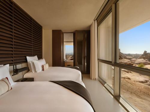 Katil atau katil-katil dalam bilik di Desert Rock Resort