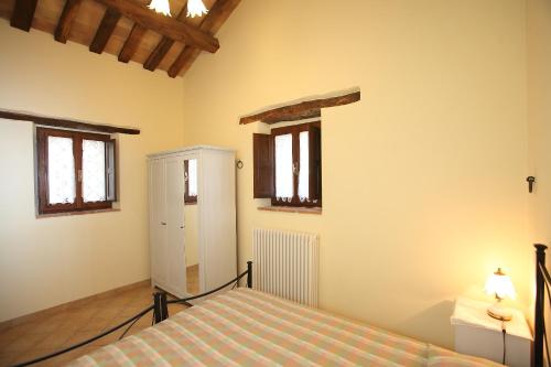 Postel nebo postele na pokoji v ubytování B&B La Chioca