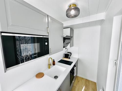 Kuchyň nebo kuchyňský kout v ubytování Katariina Apartments