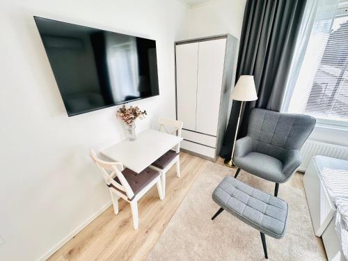 TV a/nebo společenská místnost v ubytování Katariina Apartments