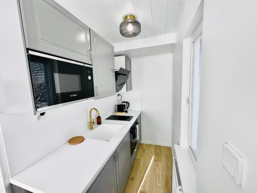 Kuchyň nebo kuchyňský kout v ubytování Katariina Apartments