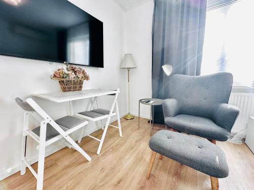 TV a/nebo společenská místnost v ubytování Katariina Apartments