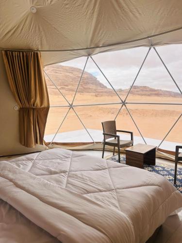 Krevet ili kreveti u jedinici u okviru objekta RUM MAGIC SANDS BuBBLES CAMP