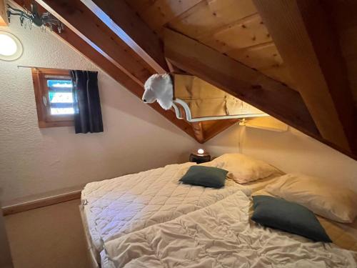 Postel nebo postele na pokoji v ubytování Chal'Oz 4 stars