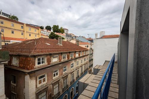 a view from a window of an old building at 54 São Paulo - Exclusive Apartment Hotel in Lisbon