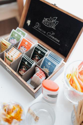 a box filled with different types of food on a table at Hotel Neptun in Vidin
