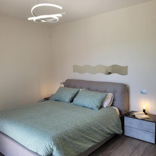 Postel nebo postele na pokoji v ubytování Garden Relais Mountain Lake Iseo Hospitality