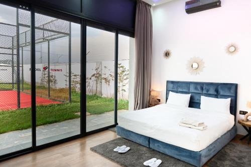 Ένα ή περισσότερα κρεβάτια σε δωμάτιο στο Villa moderne Marrakech
