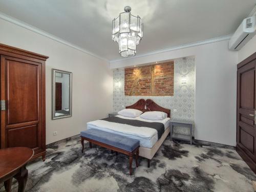 Ein Bett oder Betten in einem Zimmer der Unterkunft Monaco Ville Wellness