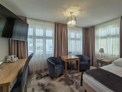 Ein Bett oder Betten in einem Zimmer der Unterkunft Monaco Ville Wellness