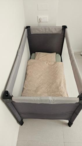 a bed in a room with a bed frame at Casa Rio Madera in San Pedro del Pinatar