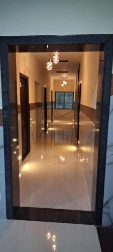 a view of a room with lights on the floor at Janardhana Residency in Dharmastala