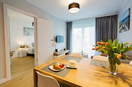 Postel nebo postele na pokoji v ubytování Apartamenty Baltic Sea Maczka 13