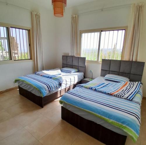 Ένα ή περισσότερα κρεβάτια σε δωμάτιο στο Authentic Lebanon