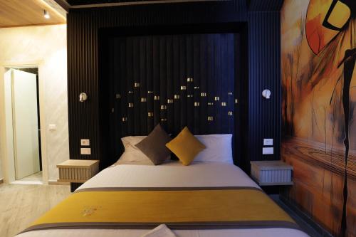 Vila One Beach Hotelにあるベッド