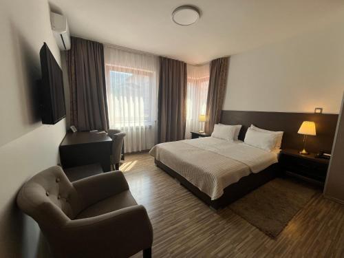 Postel nebo postele na pokoji v ubytování Hotel Divan