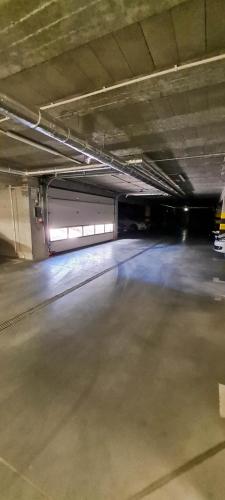 an underground parking garage with an empty parking lot at Apartament "Cztery Pory Roku" in Świdnik