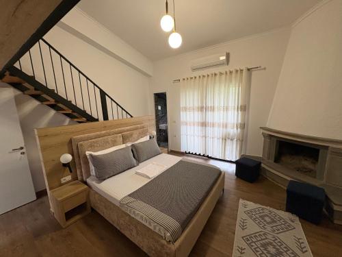 Postel nebo postele na pokoji v ubytování Salillari Guest house