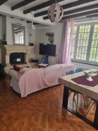 Postel nebo postele na pokoji v ubytování La Maison rose