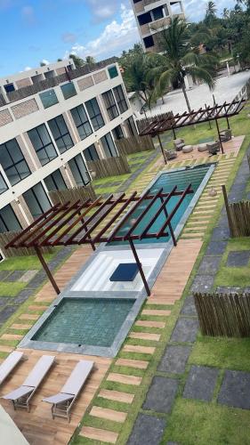 an overhead view of a building with two swimming pools at Casa cocais Atins in Barreirinhas