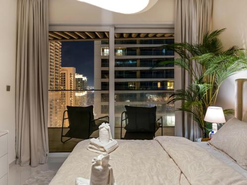 Katil atau katil-katil dalam bilik di Utra Lux Large 1 BR with Sunset Views and Private Beach