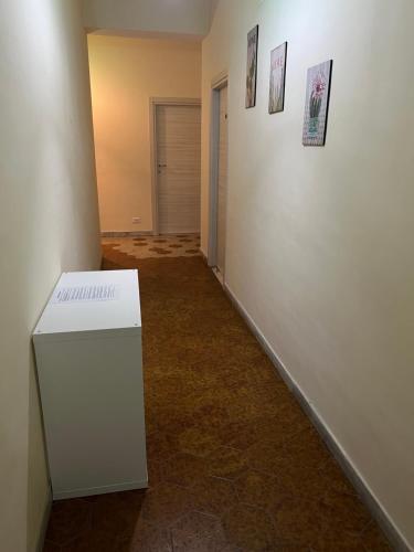 a hallway with a white box in a room at Casa Brezza Marina in Scalea
