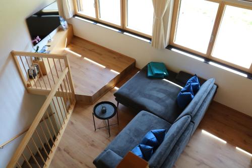 an overhead view of a living room with a couch at Appartement Bettina in Schoppernau