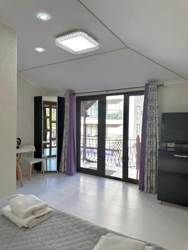 Ένα ή περισσότερα κρεβάτια σε δωμάτιο στο Hotel Kalyan & Spa