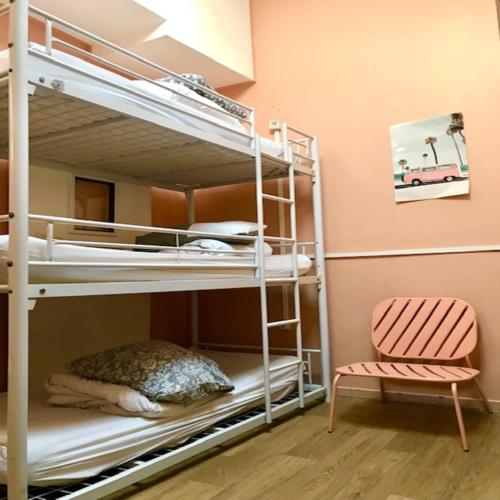 Katil atau katil-katil dalam bilik di Auberge Eco